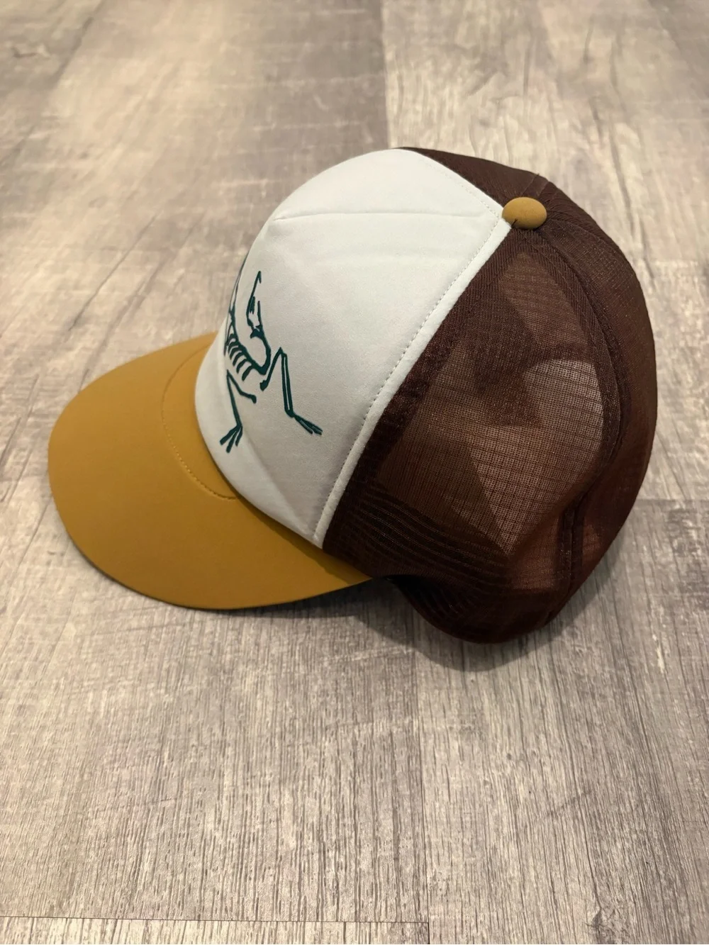 Arc’teryx Bird Trucker Hat Brown Mustard Yellow White Panel Skeleton Embroidery
